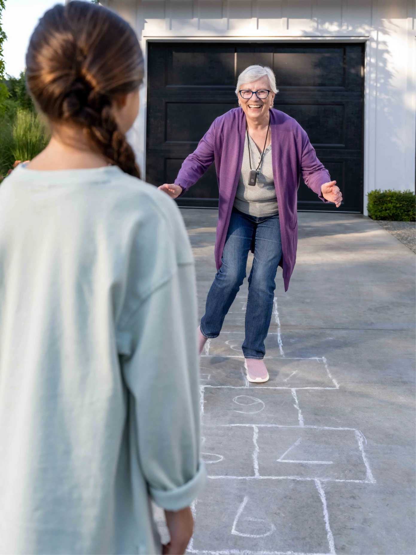 A caregiver and an older adult sharing a quiet moment at home.